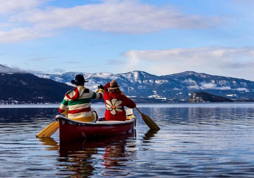 Lysle and Ron paddling in canoe