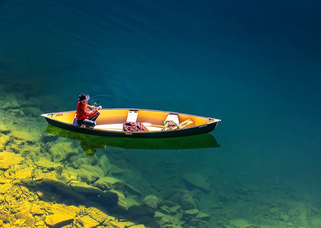 Ron on lake in canoe