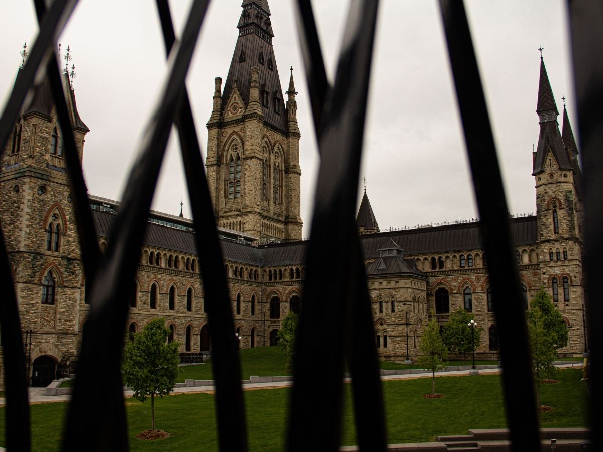 West Block of Canada's Parliament Buildings, seen through iron gate