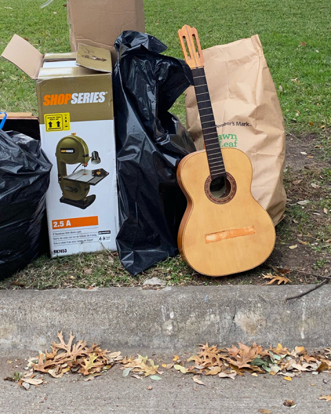 Trash pile with guitar