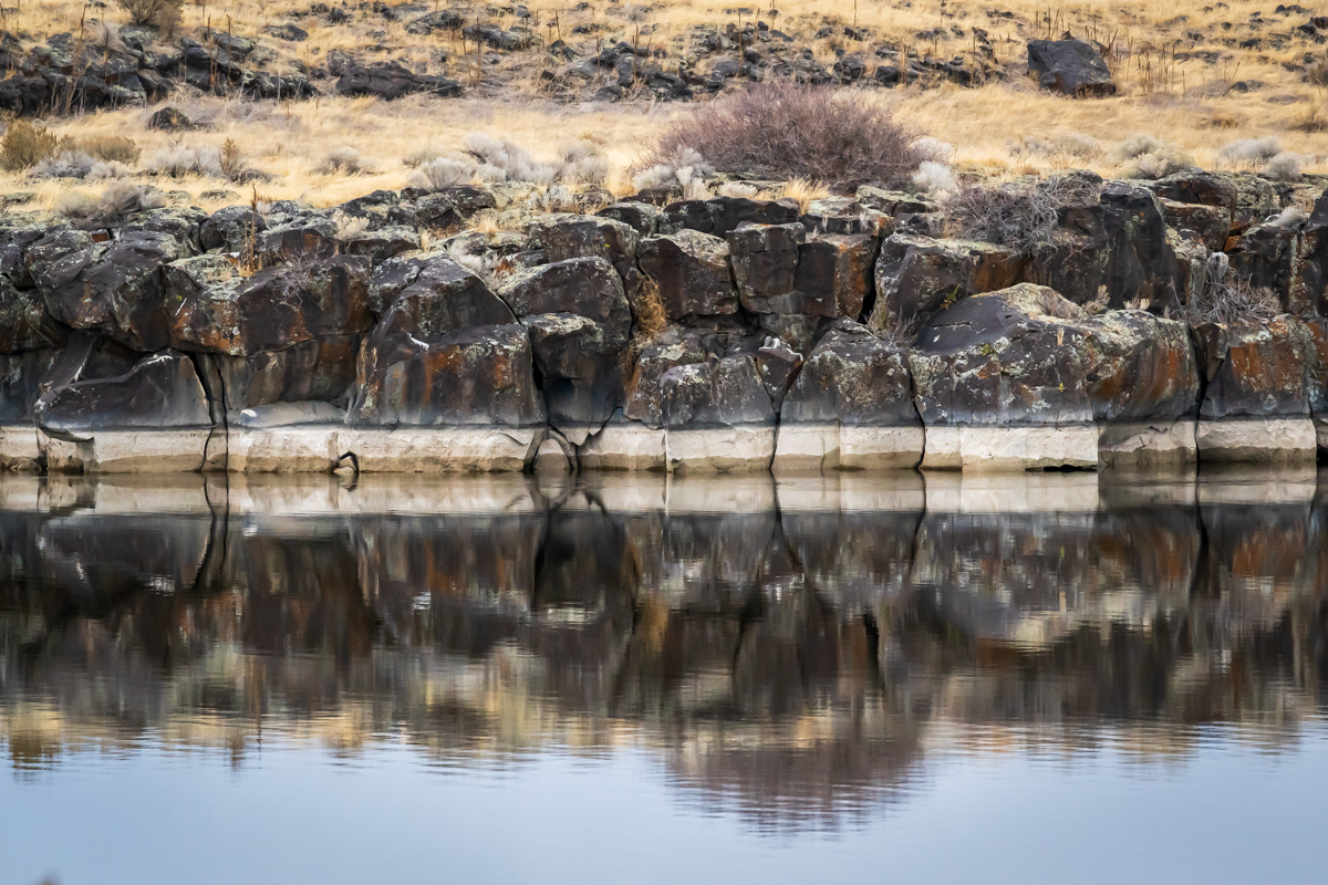 Contrast of rock on river